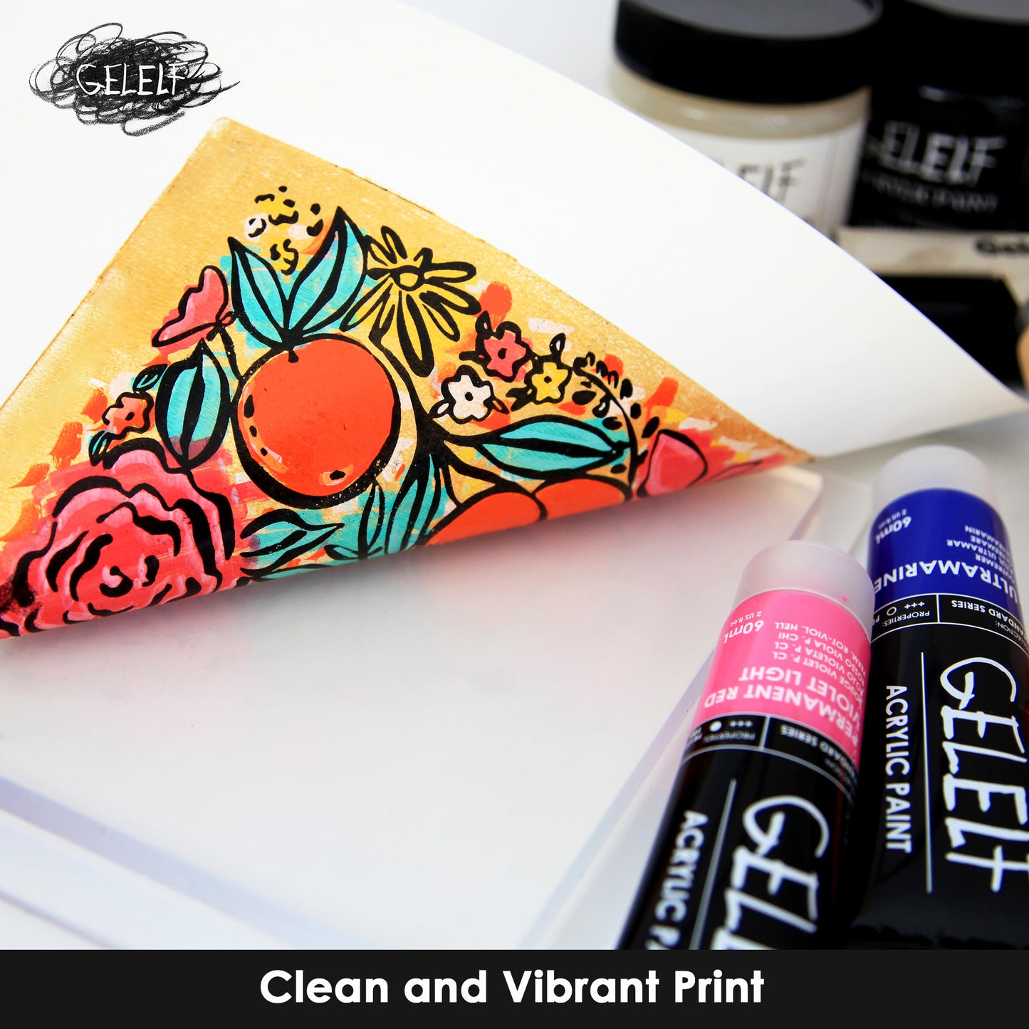 Image of artist pulling up a vibrant artwork from the gel plate and there is no paint remaining on the gel plate.